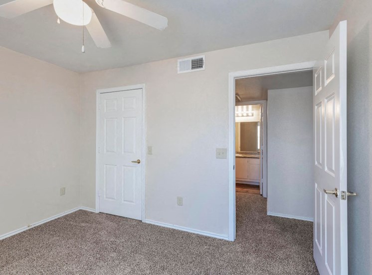 Bedroom with wall to wall carpet